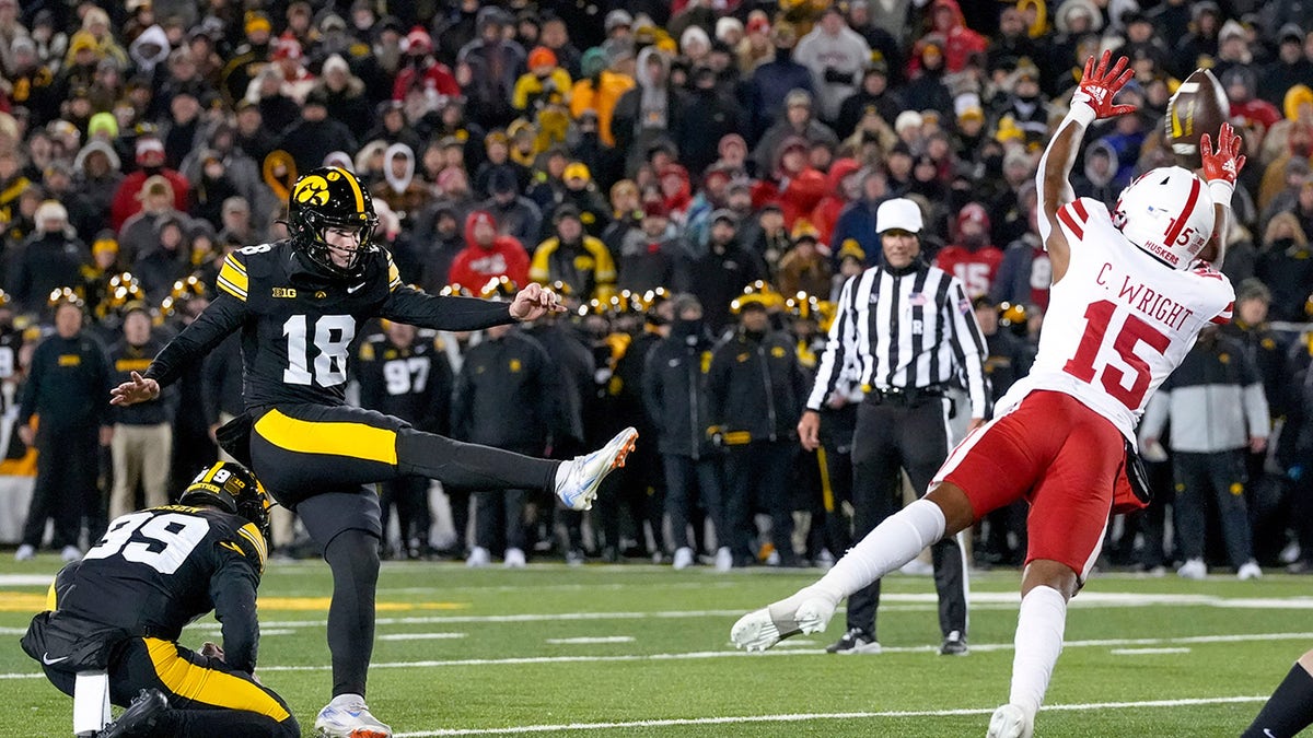 A kicker attempts a field goal