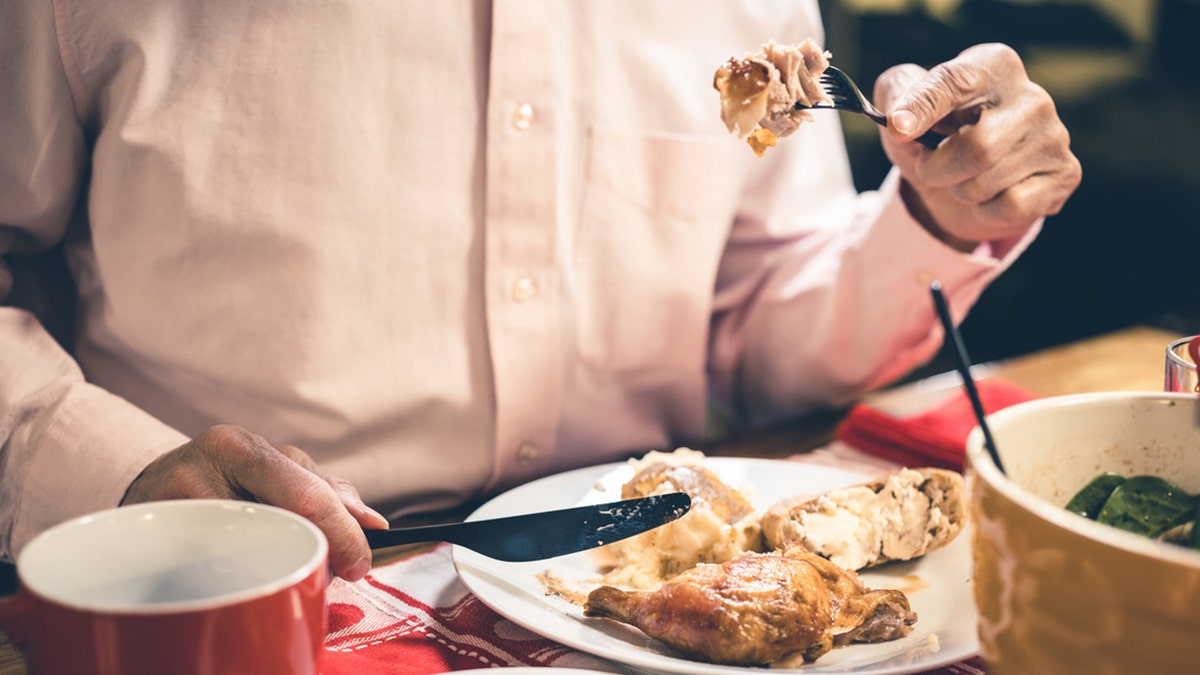 Close up of man enjoying dinner