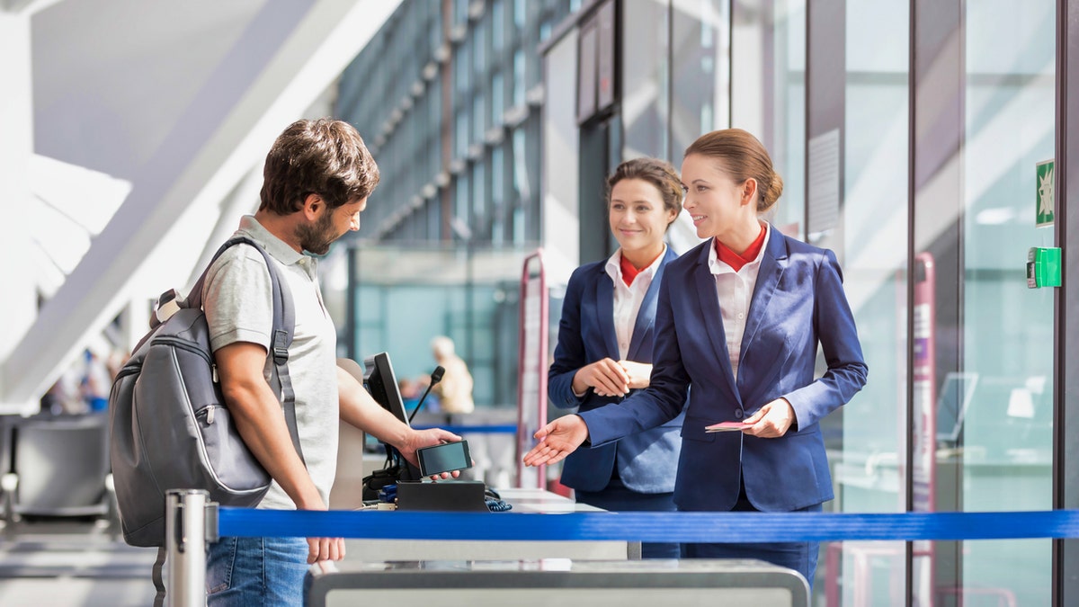 A new air travel trend, "check-in chicken," has flyers getting better seats for free while waiting out the seat selection process.