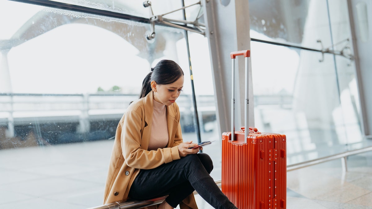 woman waiting for flight