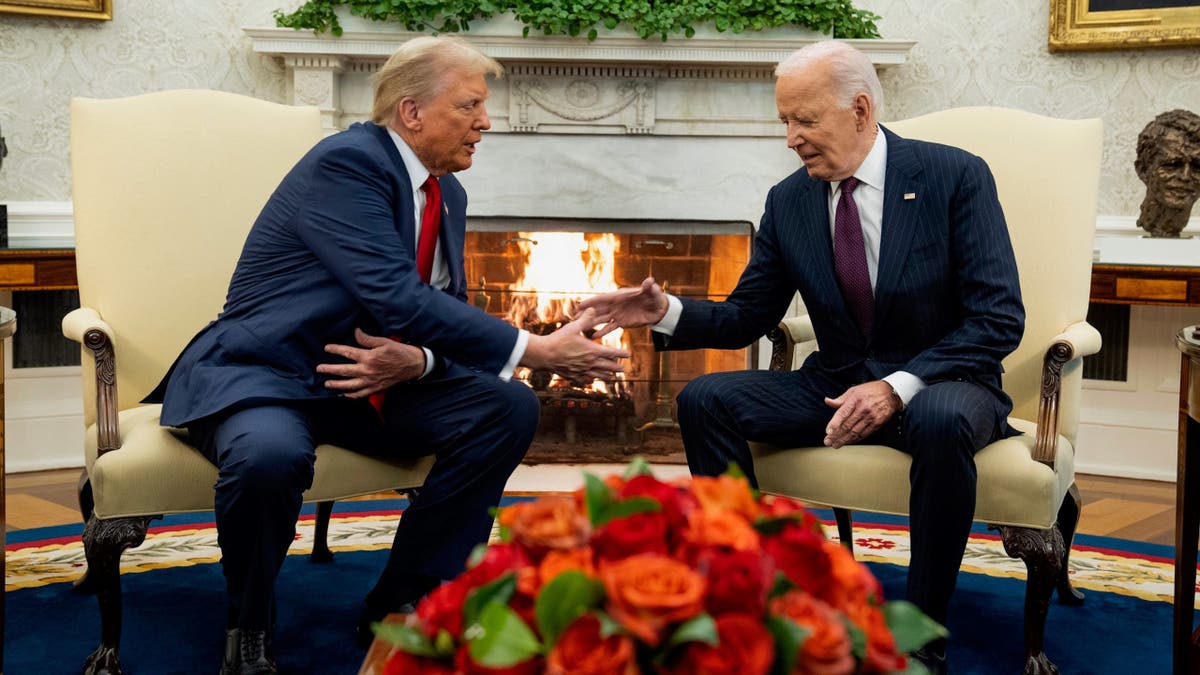 President Biden, right, shakes hands with President-elect Trump in the Oval Office of the White House in Washington, D.C., on Wednesday.