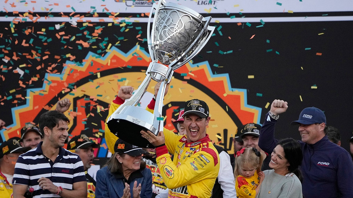 Joey Logano holds the title