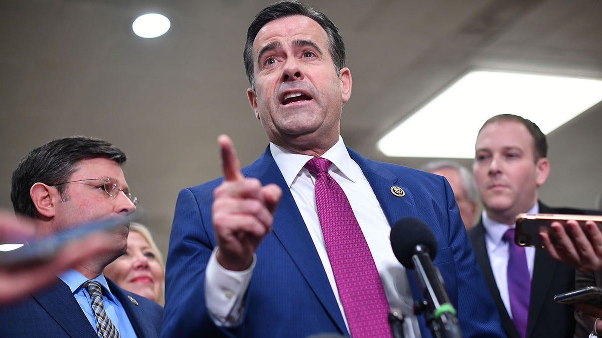 CIA Director John Ratcliffe talking to reporters