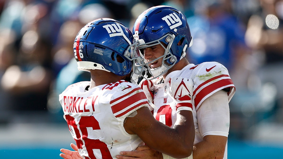 Daniel Jones and Saquon Barkley celebrate