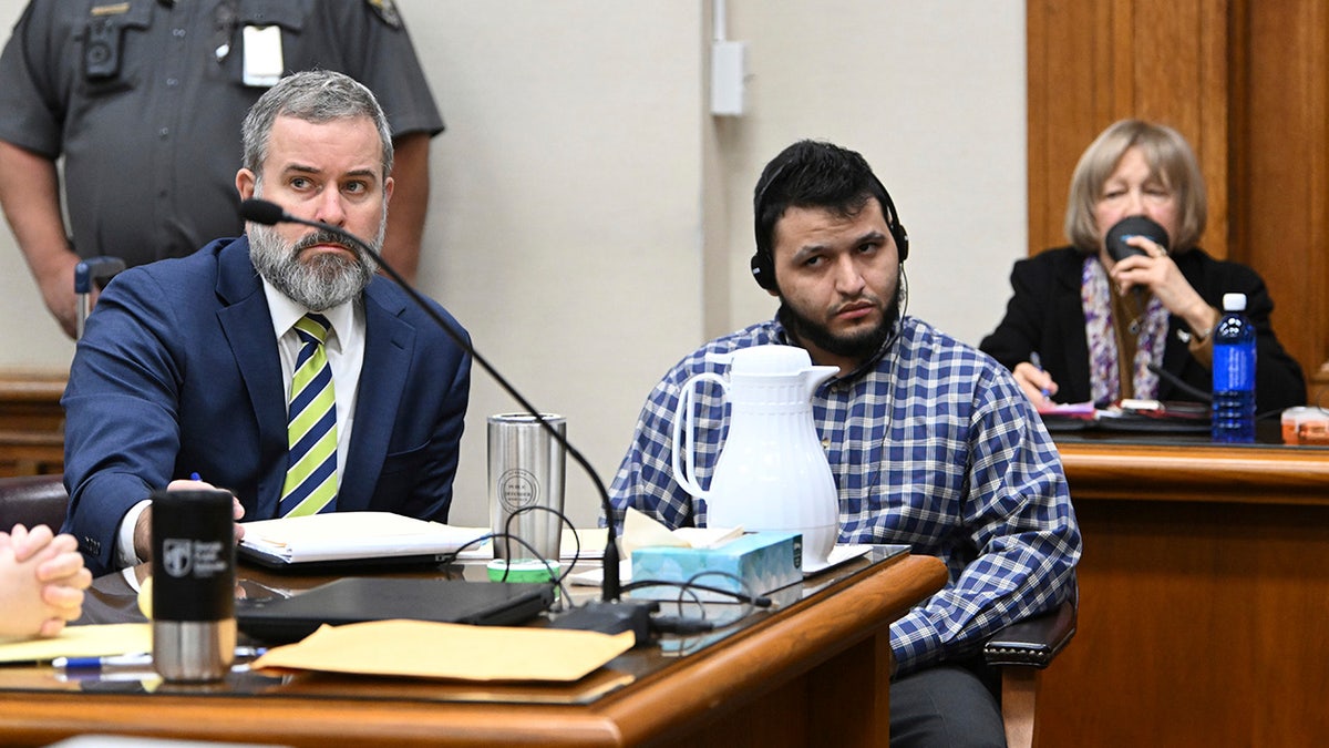 Jose Ibarra, accused of killing a Georgia nursing student earlier this year, listens through an interpreter as he sits with his attorney