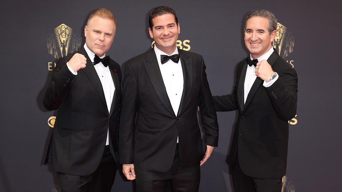 Josh Heald, Jon Hurwitz, and Hayden Schlossberg posing on the red carpet