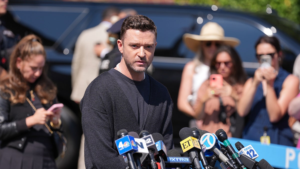 Justin Timberlake speaking to reporters