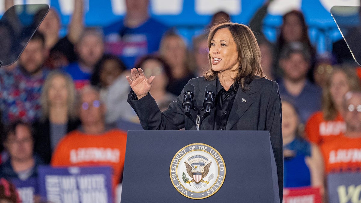 Kamala Harris behind the lectern at the rally