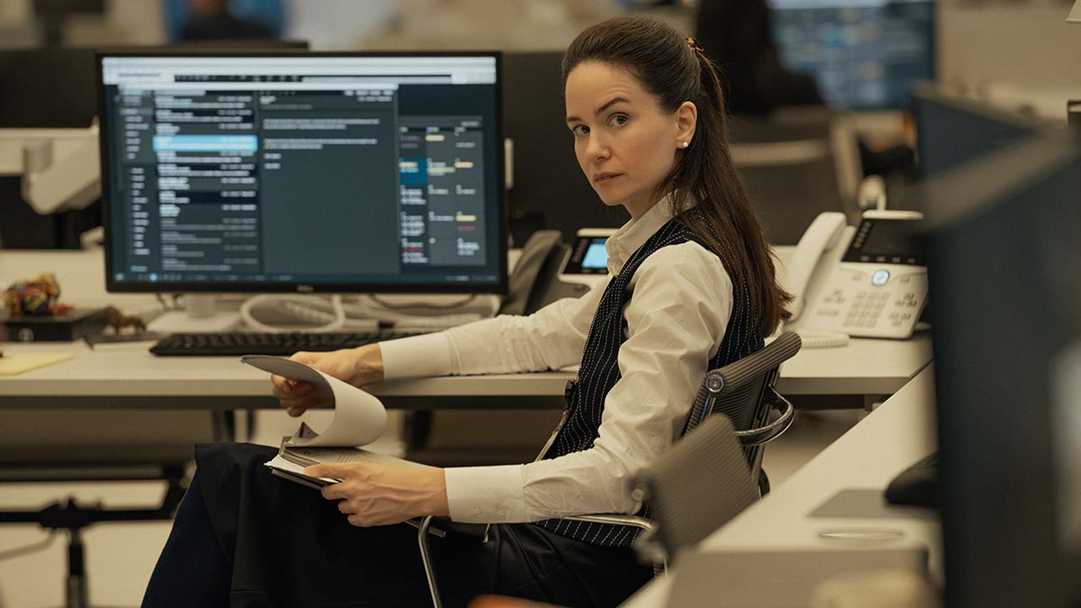 Katherine Waterston as Naomi in The Agency, 