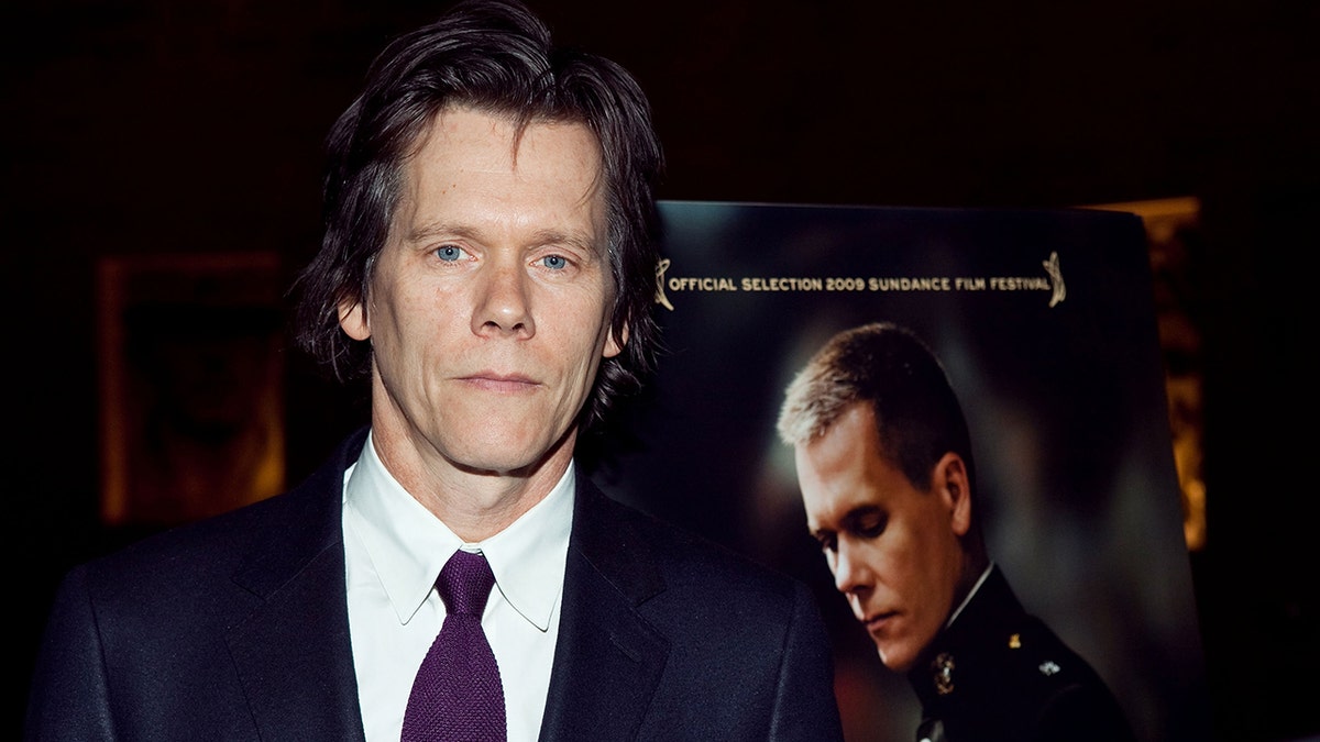 Kevin Bacon wears a suit and tie to Taking Chance premiere