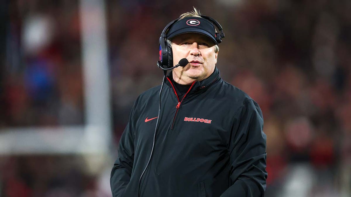 Kirby Smart stands on the sideline