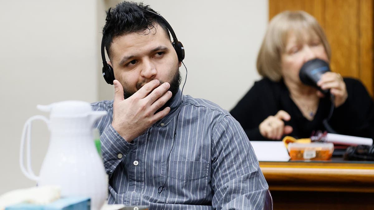 Jose Ibarra reacts as he listens through an interpreter during the second day of his trial at the Athens-Clarke County Superior Court on Monday, Nov. 18, 2024, in Athens, Ga. Jose Ibarra is facing charges for the murder of Laken Hope Riley, whose body was found on the University of Georgia campus in February.