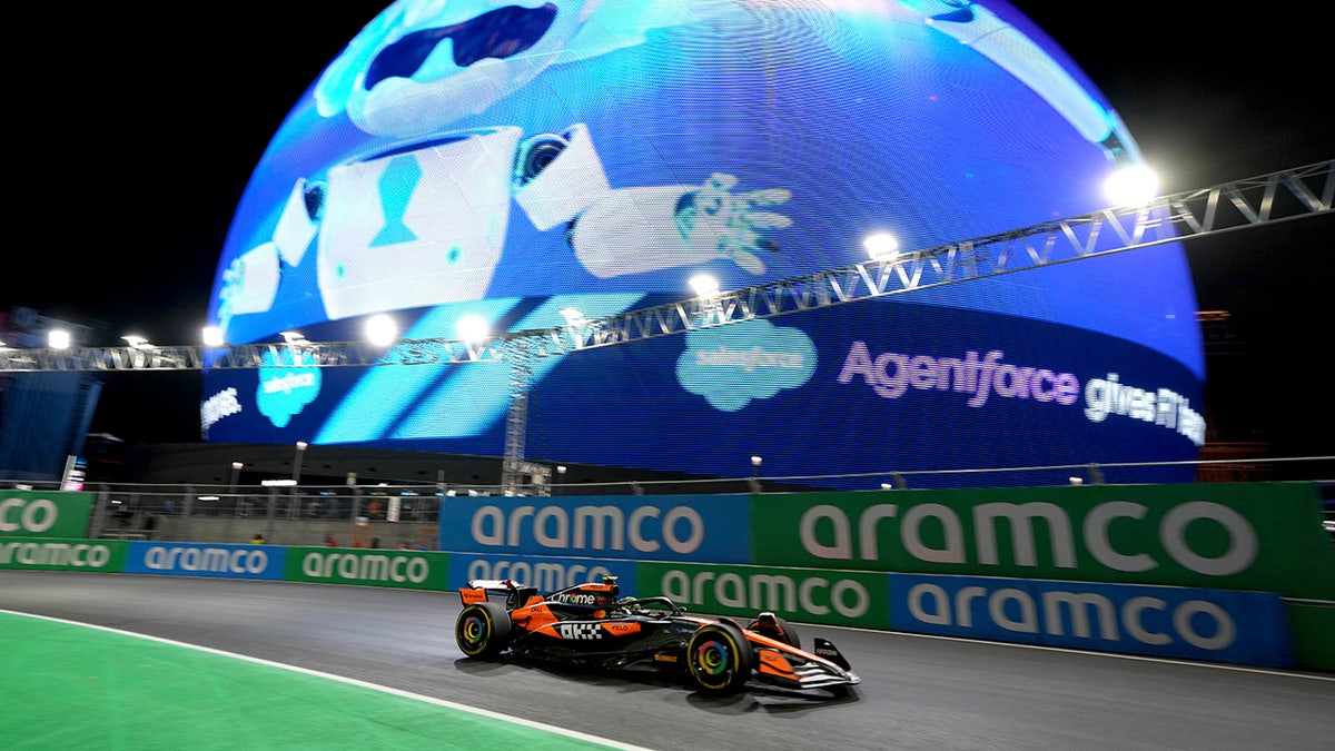 Lando Norris drives near the Sphere