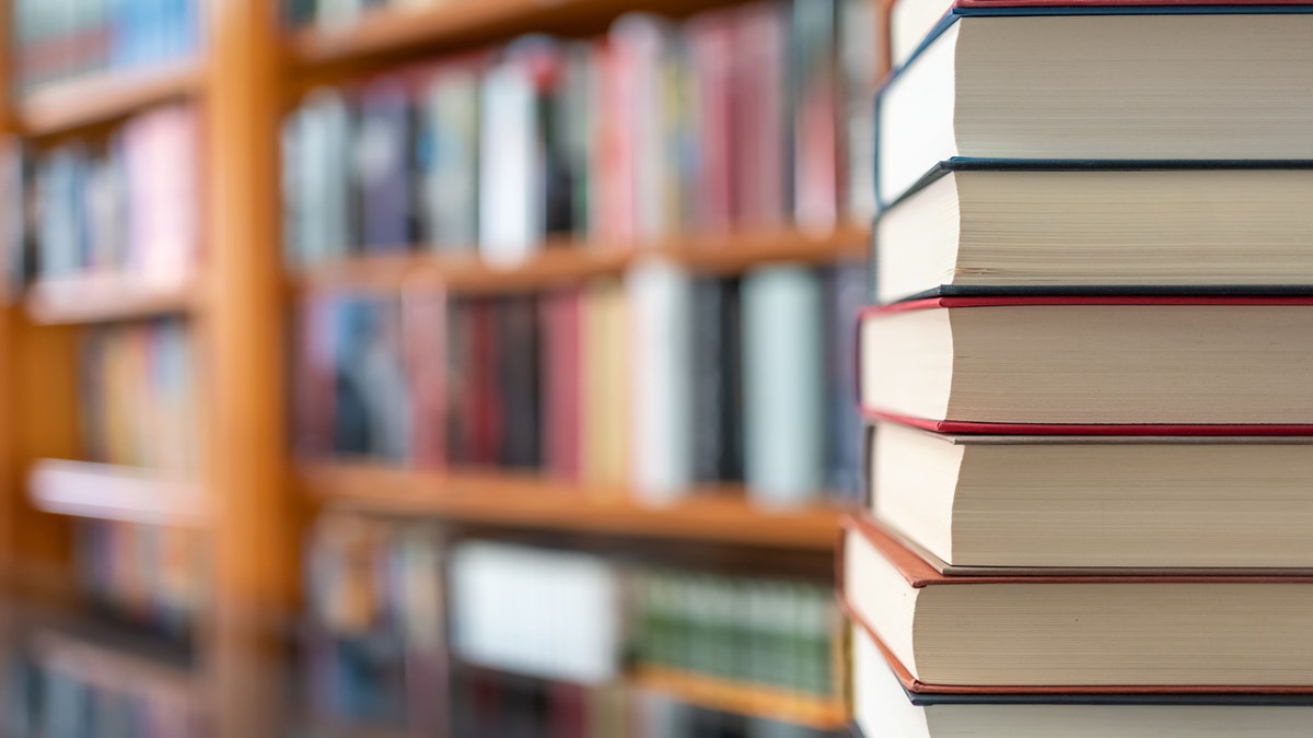 Library books stacked 