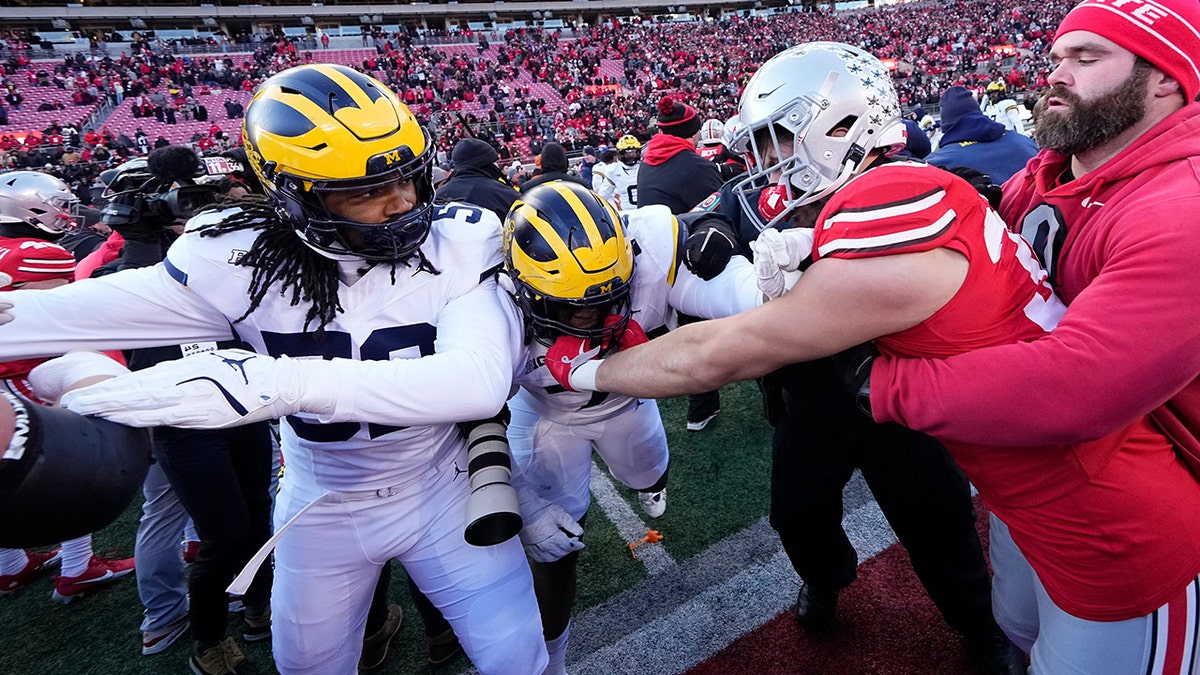 Big Ten Dishes Out Hefty Fines To Michigan, Ohio State After Postgame ...