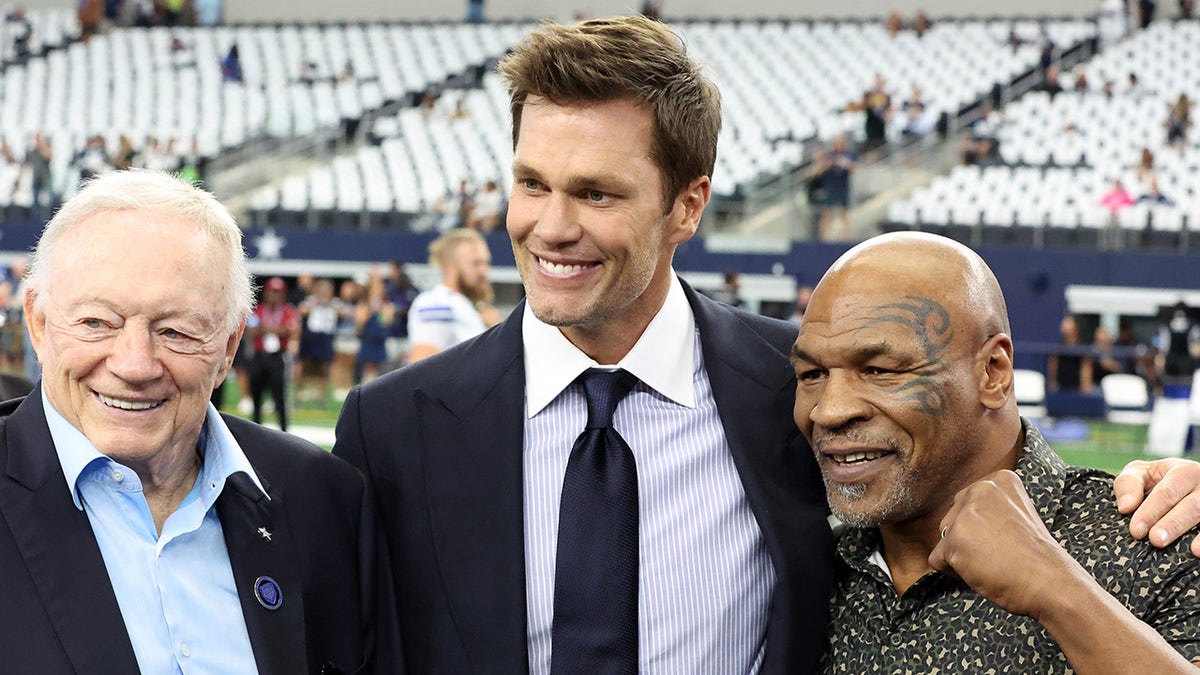 Mike Tyson with Tom Brady and Jerry Jones