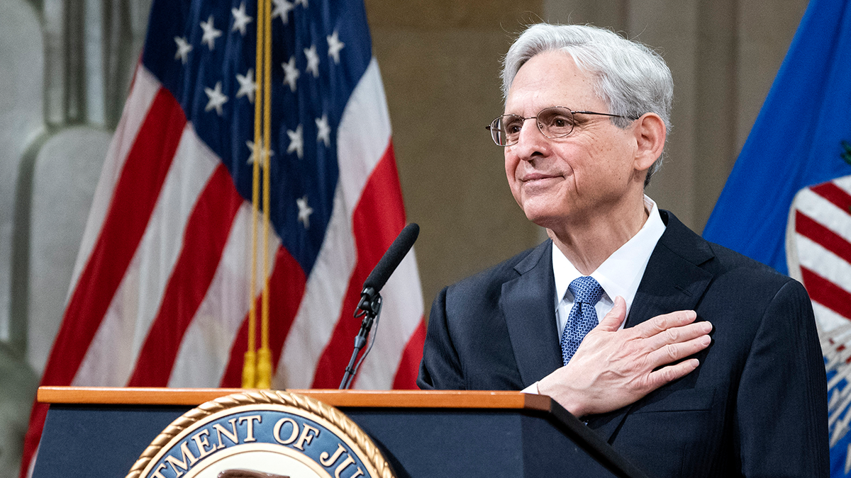 AG Merrick Garland with hand on chest