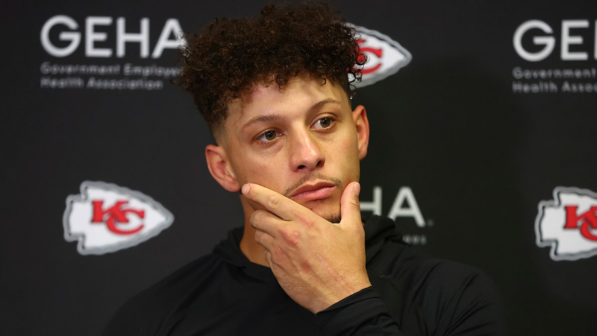 Patrick Mahomes talks to reporters