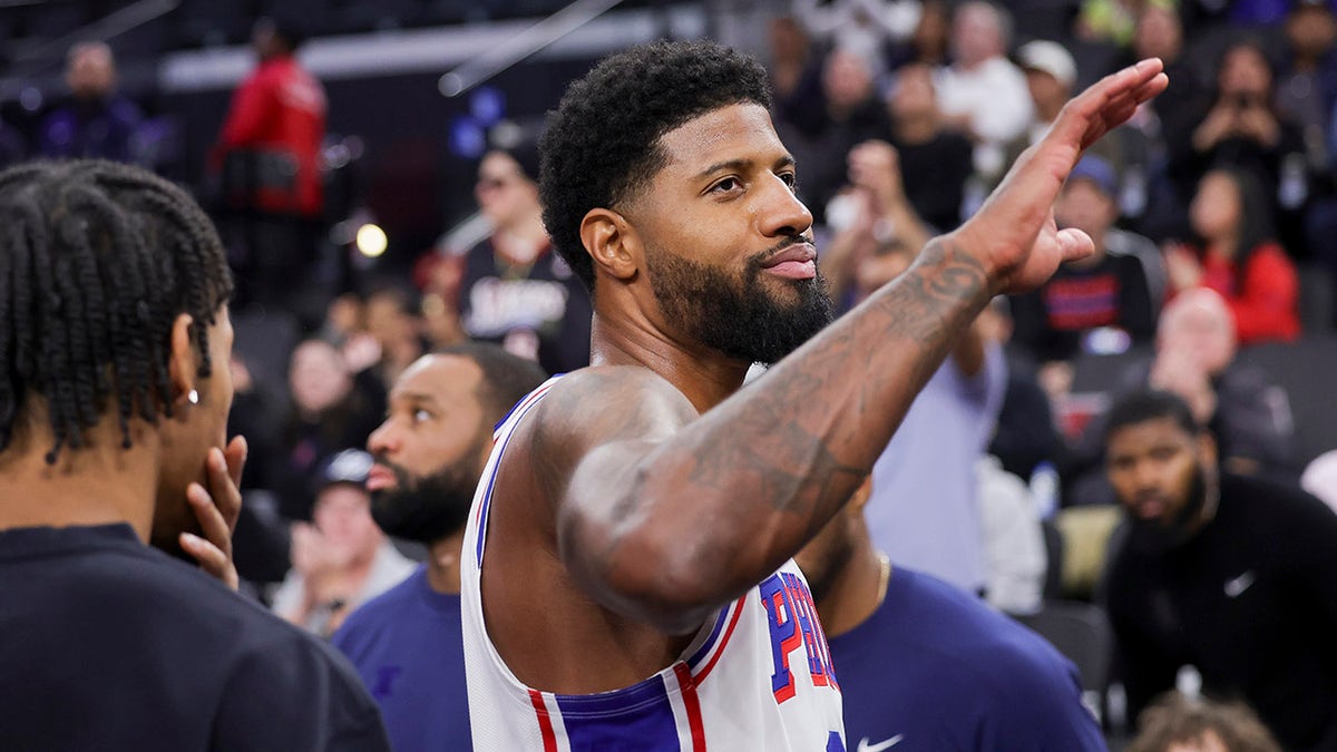 Paul George waves to the crowd