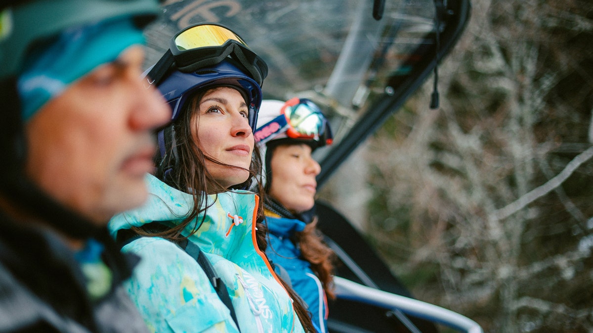 People riding the ski lift