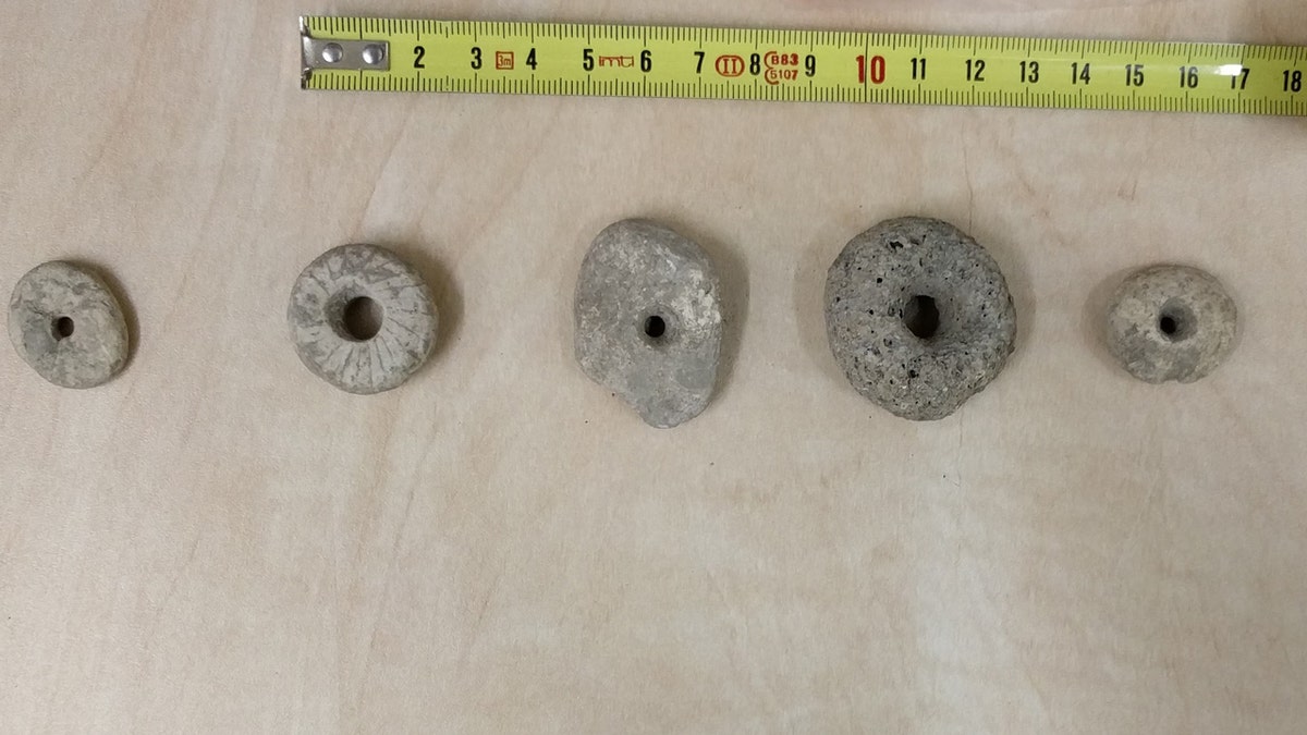 Perforated stones