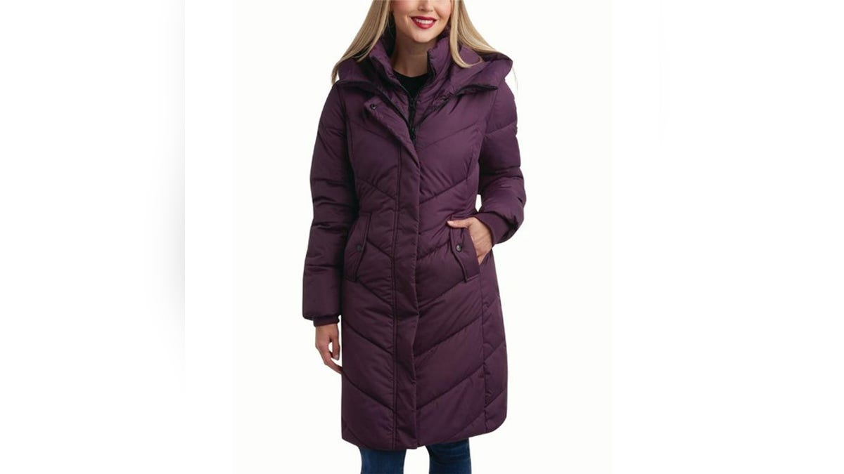 Throw on this warm winter coat on snowy days. 