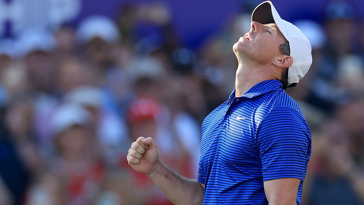 Rory McIlroy celebrates aft  win