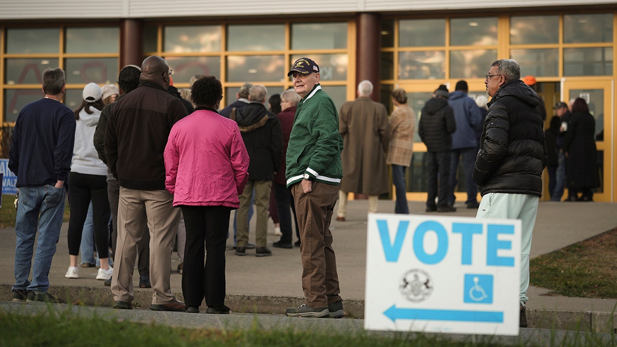 On Election Day, voters line up to cast their ballots at Scranton High School in Scranton, Pennsylvania. Scranton is a city in Lackawanna County where RNC Chairman Michael Whatley said poll watchers were initially denied entry.