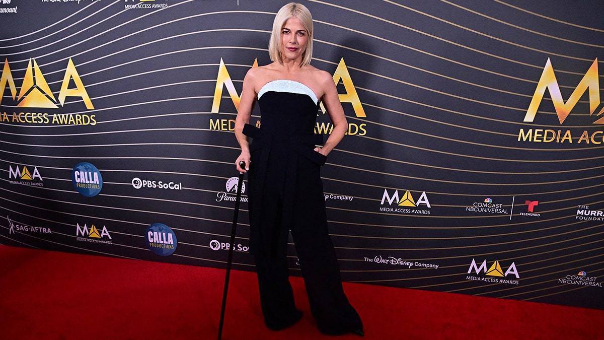 Selma Blair at the Media Access Awards in a strapless black jumpsuit.