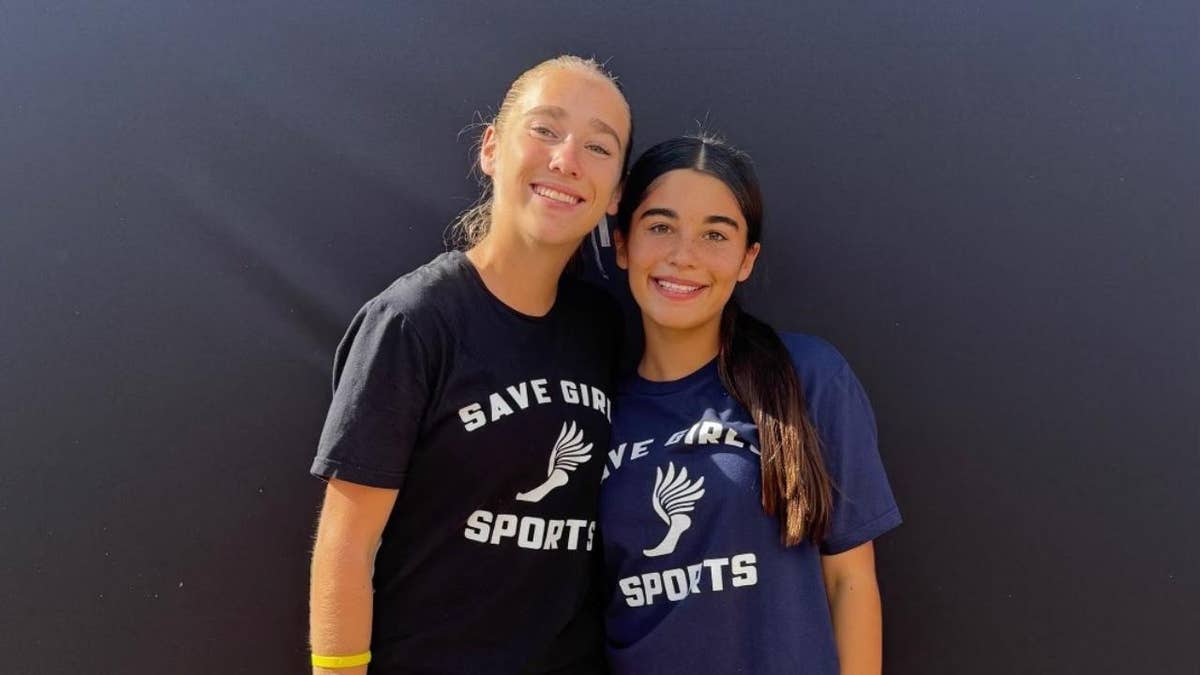 cross-country girl athletes wearing Save Girls Sports T-shirts