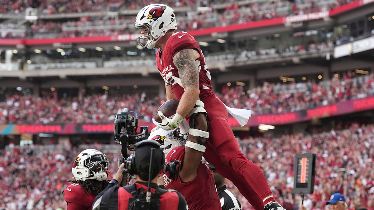 Trey McBride celebrates touchdown