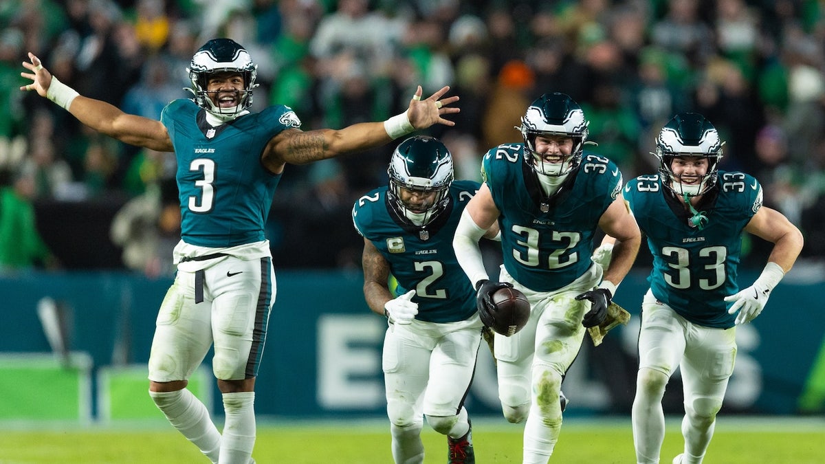 Philadelphia Eagles safety Reed Blankenship celebrates with teammates after his interception in the fourth quarter against the Washington Commanders at Lincoln Financial Field. Mandatory credit: Bill Streicher-Imagn Images