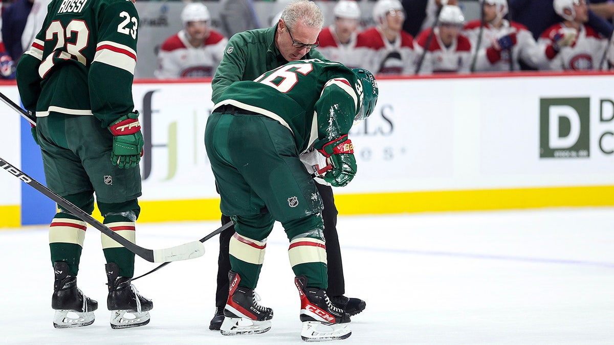 Mats Zuccarello being helped off