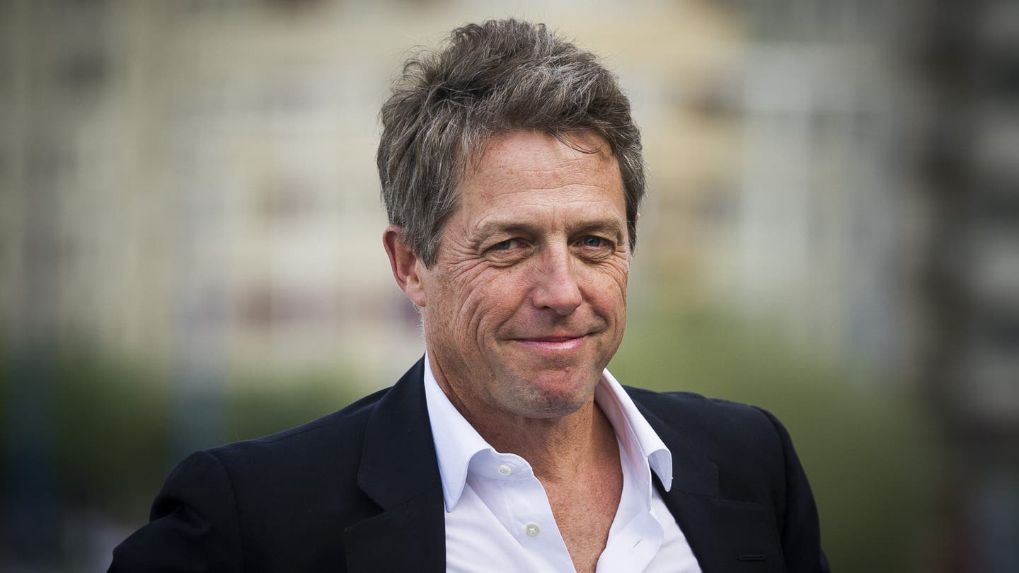 Hugh Grant's Toilet Time: Finding Refuge from the Chaos of Fatherhood