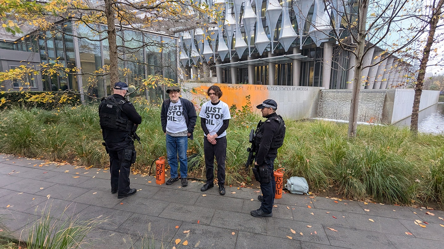 Environmental Activists Paint US Embassy Orange in Protest of Trump's Re-election