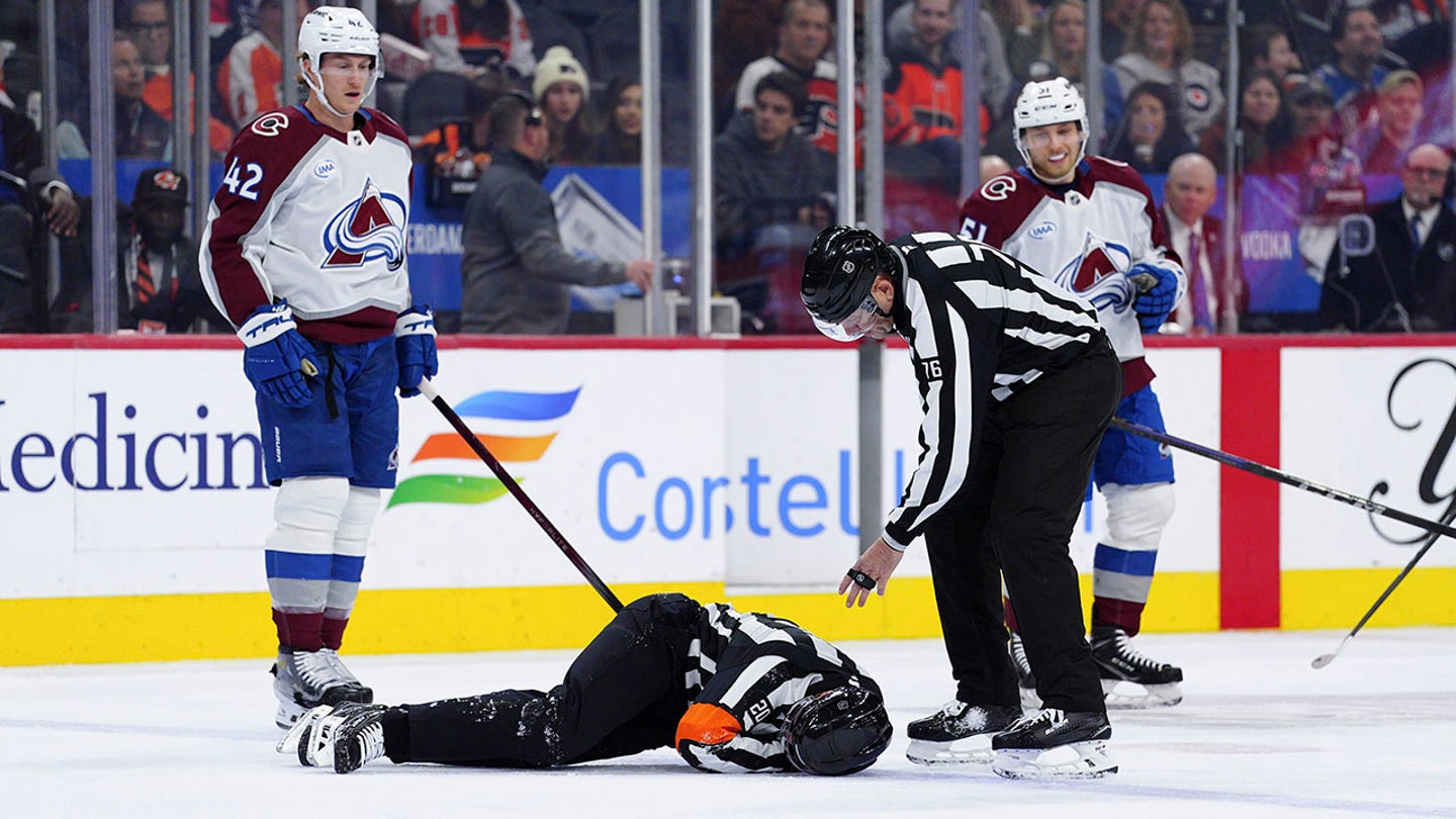 Referee Mitch Dunning Stretchered Off Ice After Collision With Avalanche Player