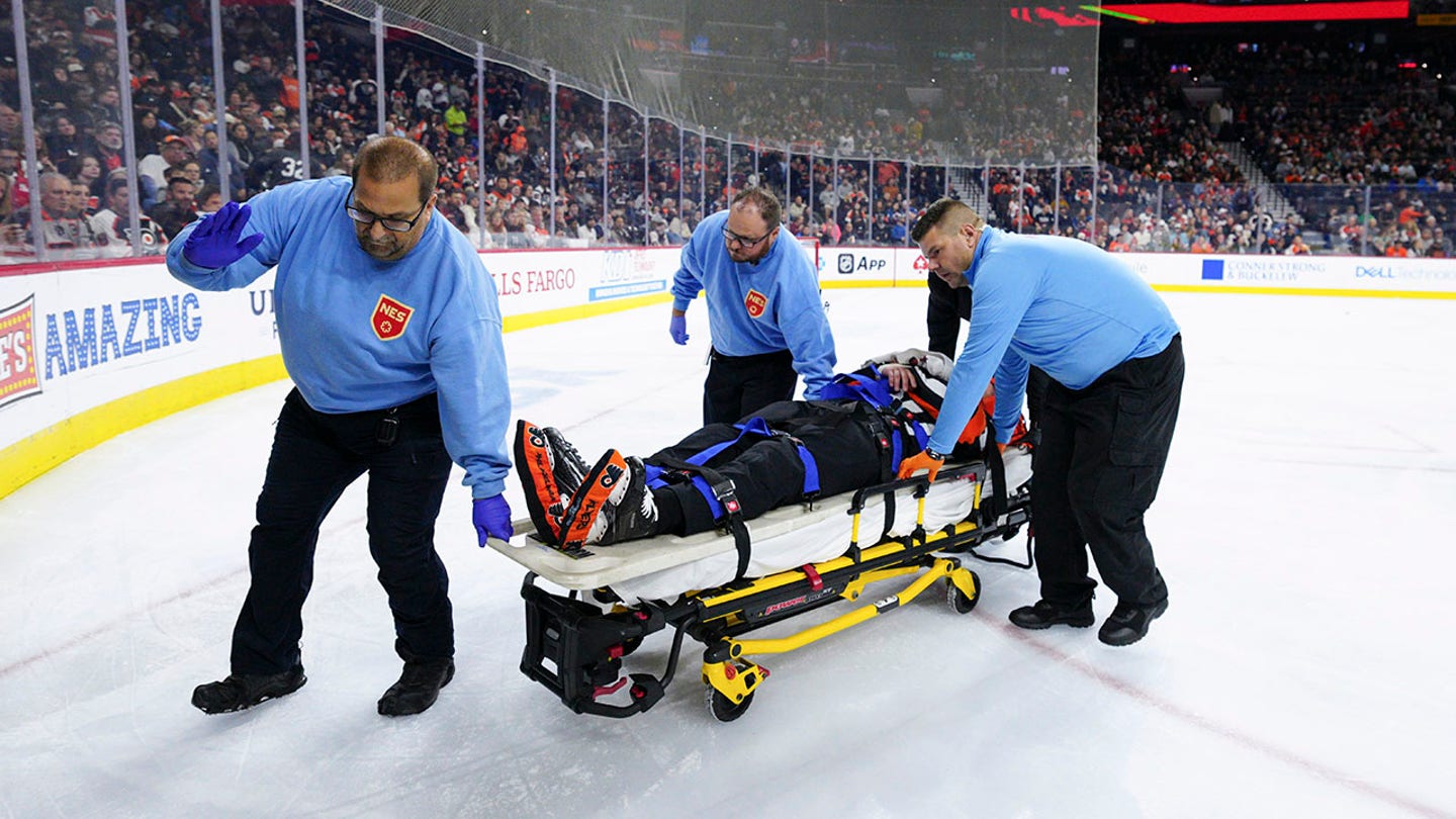 Referee Mitch Dunning Stretchered Off Ice After Collision With Avalanche Player