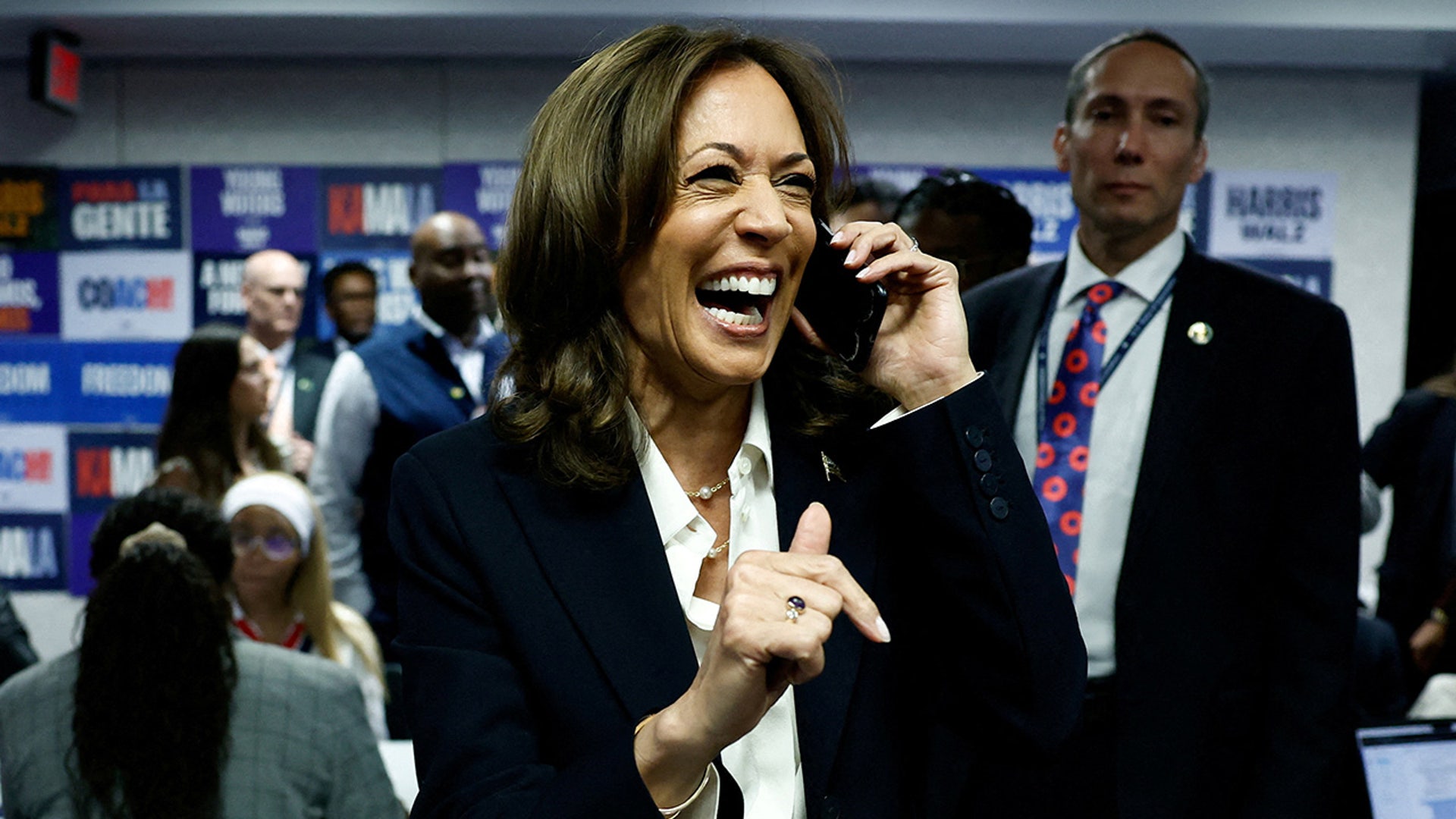 Democratic presidential nominee Vice President Kamala Harris calls voters in a last-minute campaign push at the Democratic National Committee (DNC) headquarters