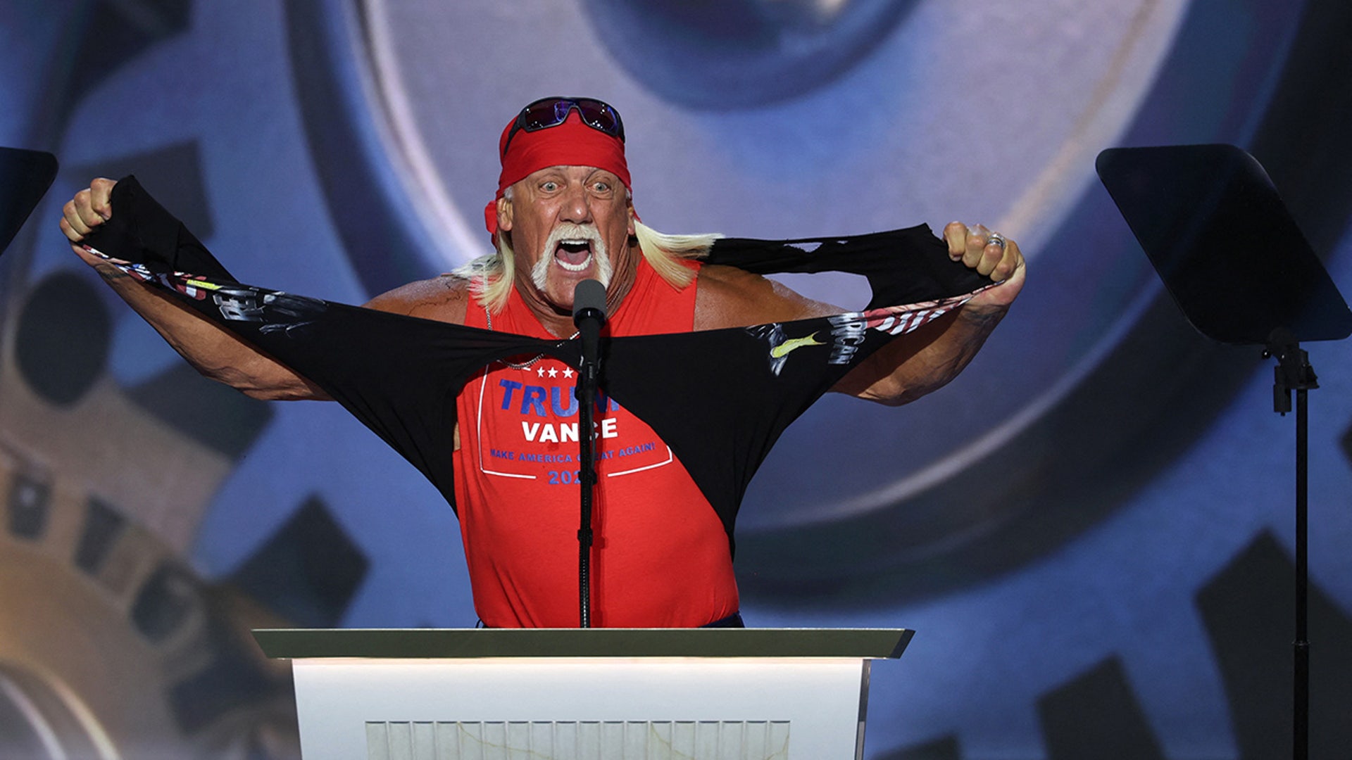 Hulk Hogan, professional entertainer and wrestler, tears his shirt open as he speaks on Day 4 of the Republican National Convention