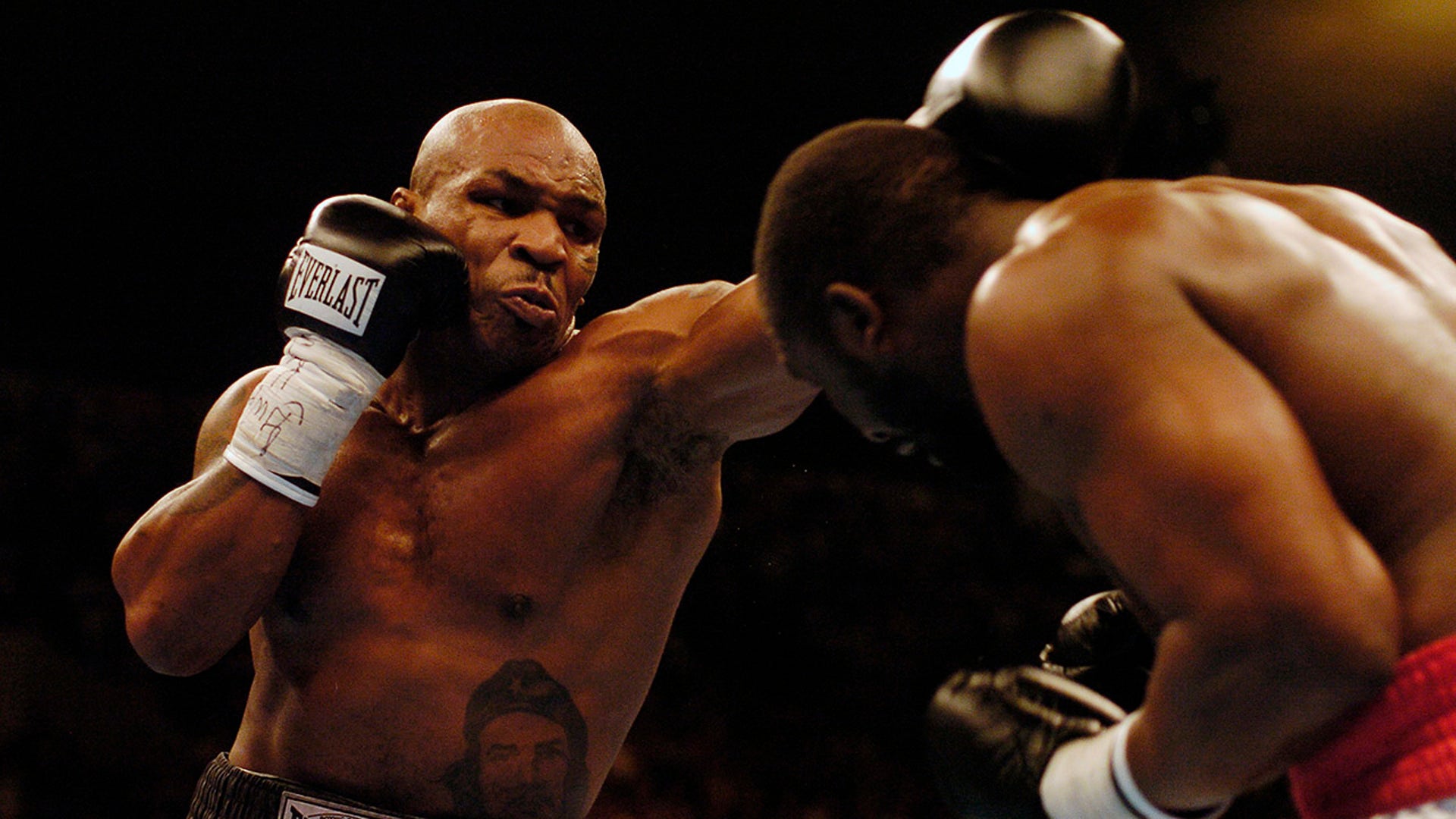 Mike Tyson misses