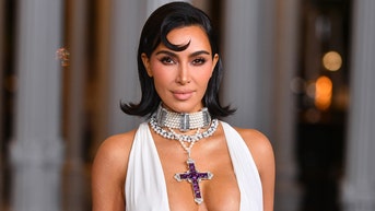 Kim Kardashian admonished for wearing religious symbol in scantily clad advertisement - Fox News