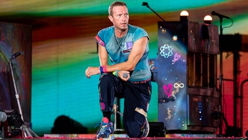 Coldplay frontman Chris Martin falls through trapdoor on Australia stage