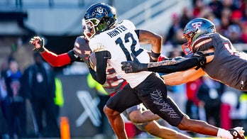 No. 20 Colorado stays alive for College Football Playoff as Heisman hopeful Travis Hunter continues dominance