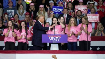 Trump invites 'brave' women's swim team that 'stood up to' transgender athlete to rally stage