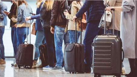 Passenger defends controversial 'gate lice' behavior as airlines crack down on early boarding attempts
