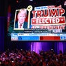 Supporters take photos as Fox News projects Republican presidential nominee, former U.S. President Donald Trump is elected president during an election night event