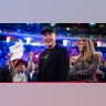 Elon Musk and former first lady Melania Trump listen as Republican presidential nominee former President Donald Trump speaks at a campaign rally at Madison Square Garden