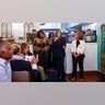Democratic presidential nominee Vice President Kamala Harris speaks next to Mayor of Philadelphia Cherelle Parker, Philadelphia City Councilmember Quetcy Lozada and Philadelphia's Puerto Rican community during a visit at the Freddy and Tony's