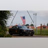 A state trooper car blocks an entrance to the event grounds where the rally was held during the law enforcement investigation into gunfire at a campaign rally of Republican presidential candidate and former President Donald Trump