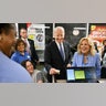 President Joe Biden and First Lady Jill Biden make a purchase as they visit a Waffle House after Biden participated in the first presidential debate